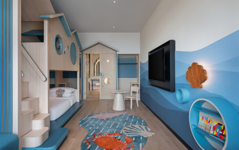 the kids' room in the family room or suite is decked in oceanic themes