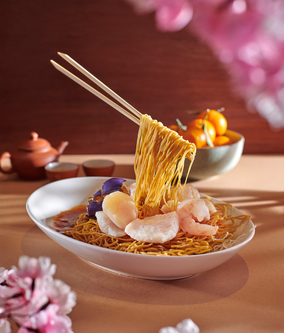 Golden Phoenix Braised seafood with longevity noodles and eggplant with ‘topa’ sauce